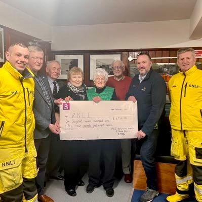 Members of Ballymoney Branch present cheque to RNLI Portrush