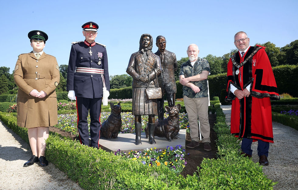 The Lord-Lieutenant of County Antrim, Mr David McCorkell KStJ and Deputy Mayor, Councillor Paul Dunlop BEM are joined by sculptor, Anto Brennan at the unveiling