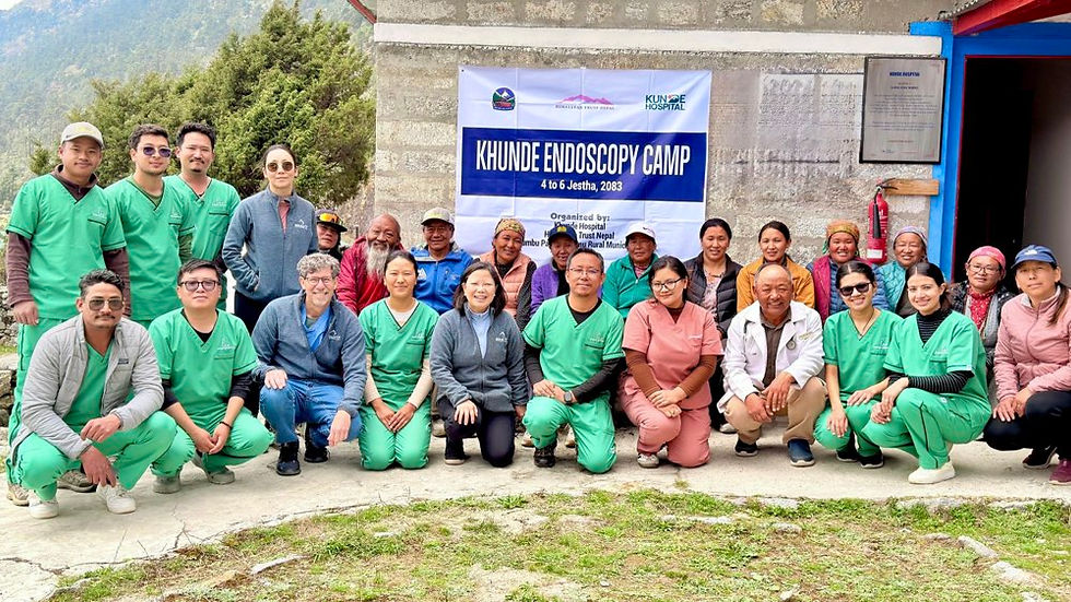 Dr Amrita Gurung (back row, fourth from left) with fellow healthcare professionals and patients at the Khunde Endoscopy Camp in Nepal.