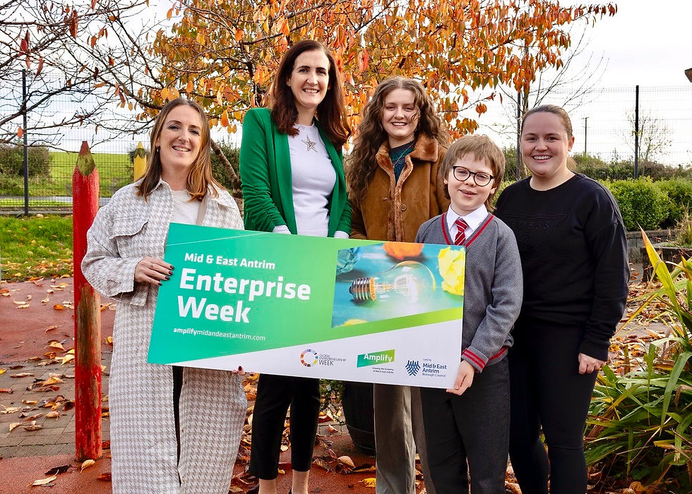 Gabriel Hirst from Millquarter Primary School with Christine Barnhill Economic Development Officer, Principal of Millquarter Primary School, Jamie from the Milk Parlour and Mrs McNamee from Millquarter Primary School.