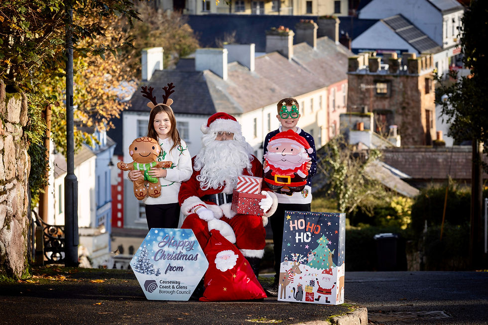 Santa pictured with local school children at the launch the 2025 Christmas Light Switch Ons in the Borough.