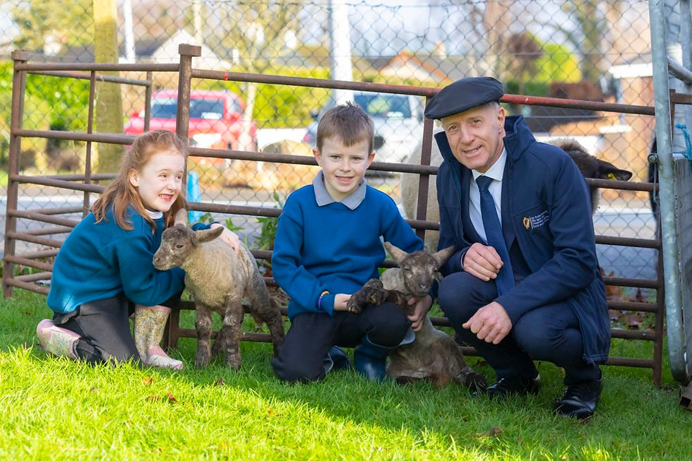 Saoirse Stacey and Oran Masterson with Irish Minister Michael Healy-Rae at Carrigduff National School, Bunclody, Wexford at the launch of the AgriKids Farm Safety Ambassador School Programme.