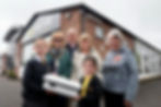 Doagh Primary School pupils celebrate the installation of three new swift nest boxes and a caller system at alongside the Outgoing Deputy Mayor Cllr Gilmour, RSPB Antrim Local Group representatives Edward McKee, Esther McKee and Kate McAllister.