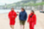 Lifeguards Bartosz Wesolowski and Emma-Jane Service with Andrew Todd