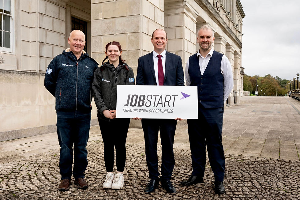Communities Minister Gordon Lyons is pictured with Gary Hazlett and Carla Marriott, K9tergarten and Caorlan McAllister from Halfway House as he has announced a new £12.4 million employment drive to support working age benefit claimants into work.