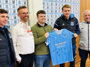 Ballymena United stars inspire young readers at Dunclug Primary on World Book Day