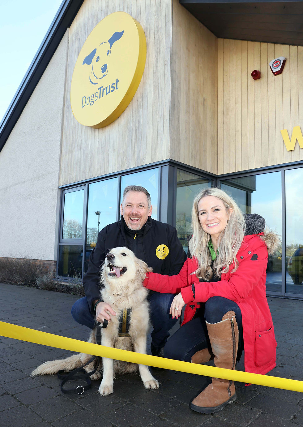 Dogs Trust Chief Executive Owen Sharp and Holly Hamilton with Ernie at Dogs Trust Ballymena