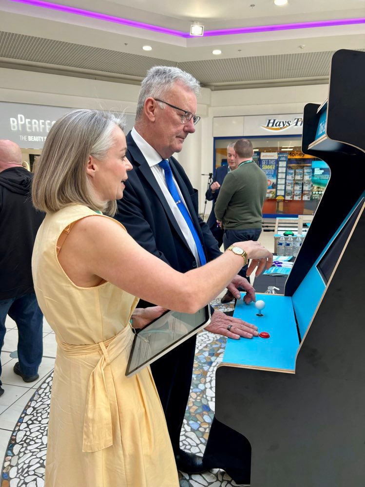 Bronagh Donnelly from PHA shows Health Minister Mike Nesbitt the retro engagement tools used as part of the ‘This is our health’ roadshows.