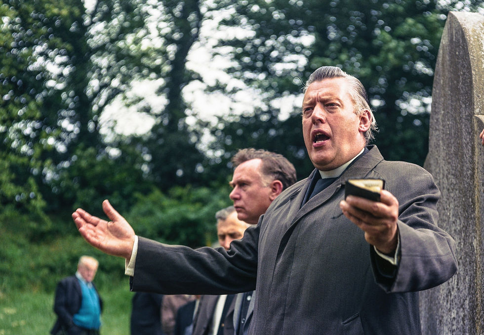 The late Reverend Ian Paisley speaking outside.