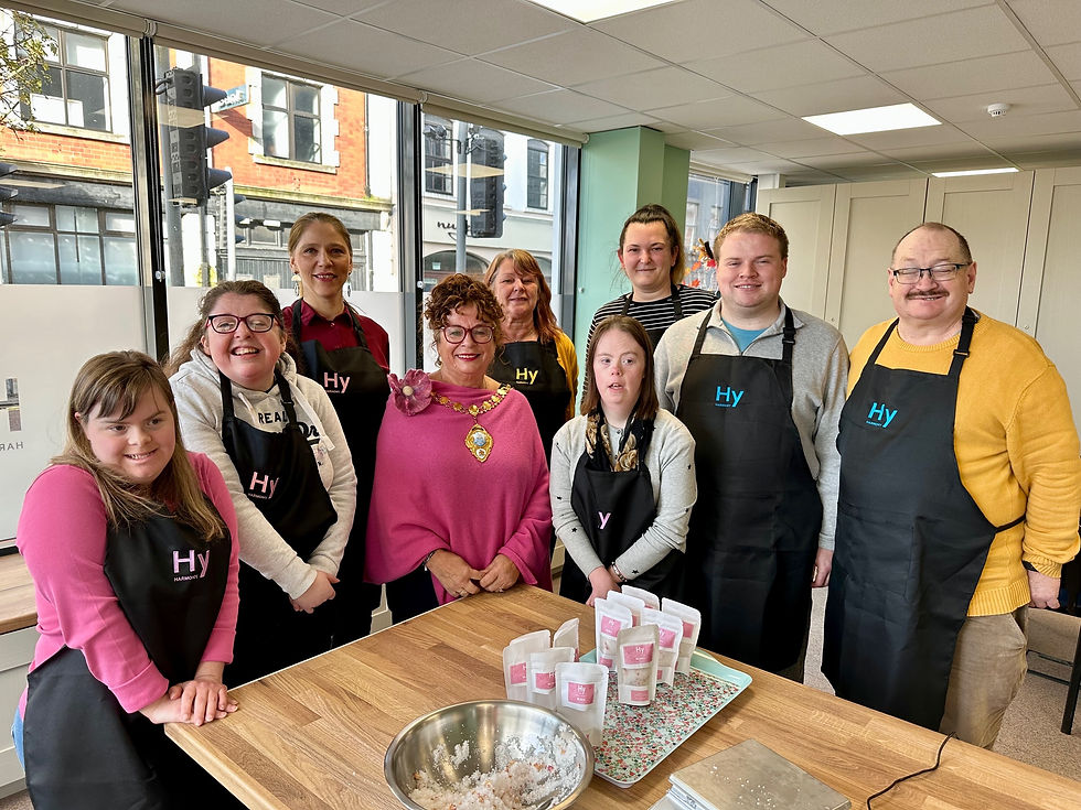 Triangle Housing Association’s service users and staff of Harmony Studio alongside Mayor Alderman Gerardine Mulvenna.