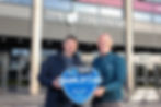 Adam Keefe, Head Coach, Belfast Giants; and Steve Thornton, Sports Director, The Odyssey Trust with the 2026 3ICE World Cup logo outside The SSE Arena, Belfast.