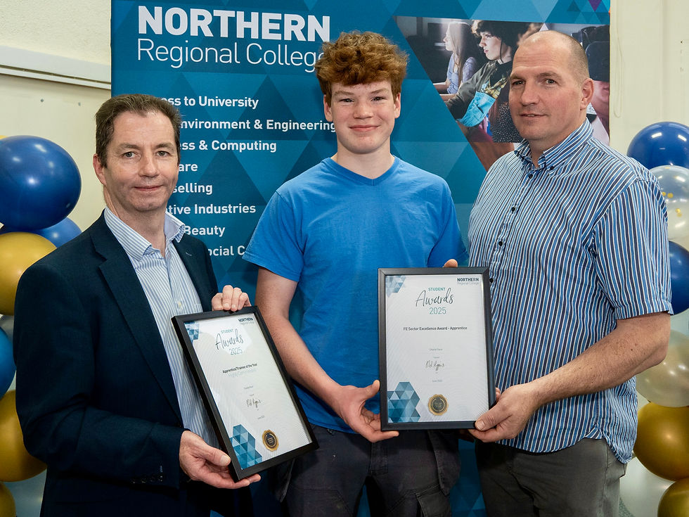 Charlie Fleck, highly commended in the Apprentice/Trainee of the Year – Level 2 Carpentry & Joinery category and recipient of the FE Sector Excellence Award – Apprentice, pictured with his lecturer Adrian Symth and Mel Higgins, Principal & Chief Executive of Northern Regional College.