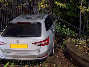 Man arrested after police vehicle rammed off road