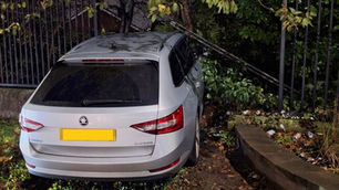 Man arrested after police vehicle rammed off road