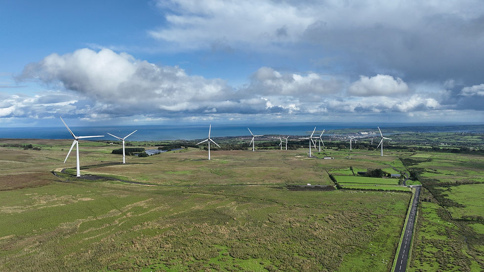 Wind turbines at the Ballykeel wind farm in the Antrim Hills overlooking the Irish Sea