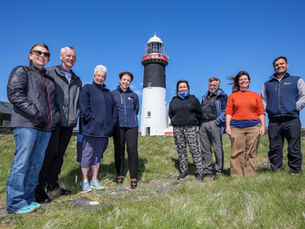 Minister Liz Kimmins visits Rathlin Island, praises green energy vision and community-led initiatives
