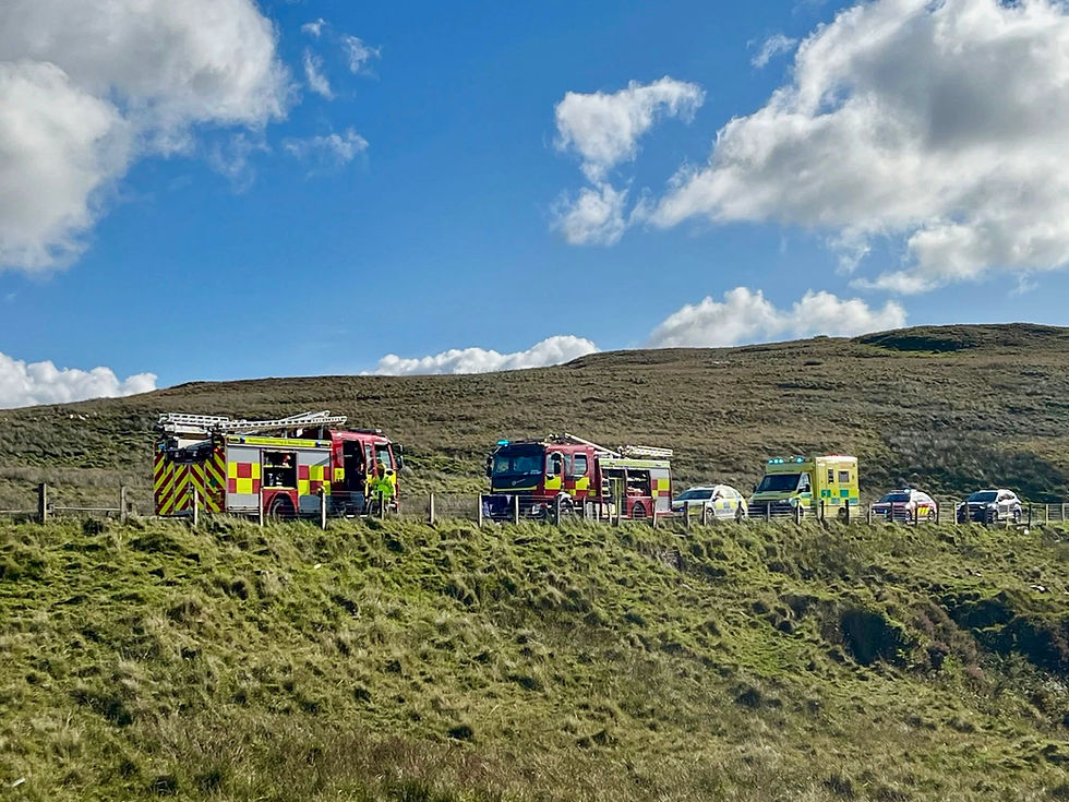Emergency Service crews at the scene of the collision on Sunday near Cargan, County Antrim.