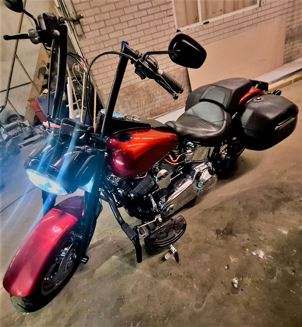 Motorbike that was seized during searches of the property by police service of northern ireland