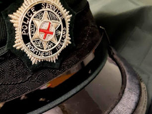 Teenager charged over petrol bomb attack that left police officer with facial burns