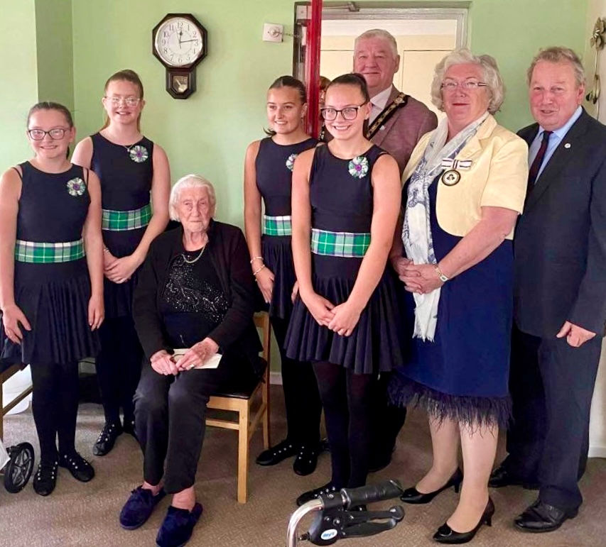 Maisie with Limavady Highland Dancers; (L-R) Mayor of Causeway Coast and Glens, Steven Callaghan; Dr Sheelagh Hillan, MBE, DL; and Northern Ireland Veteran's Commissioner Danny Kinahan.
