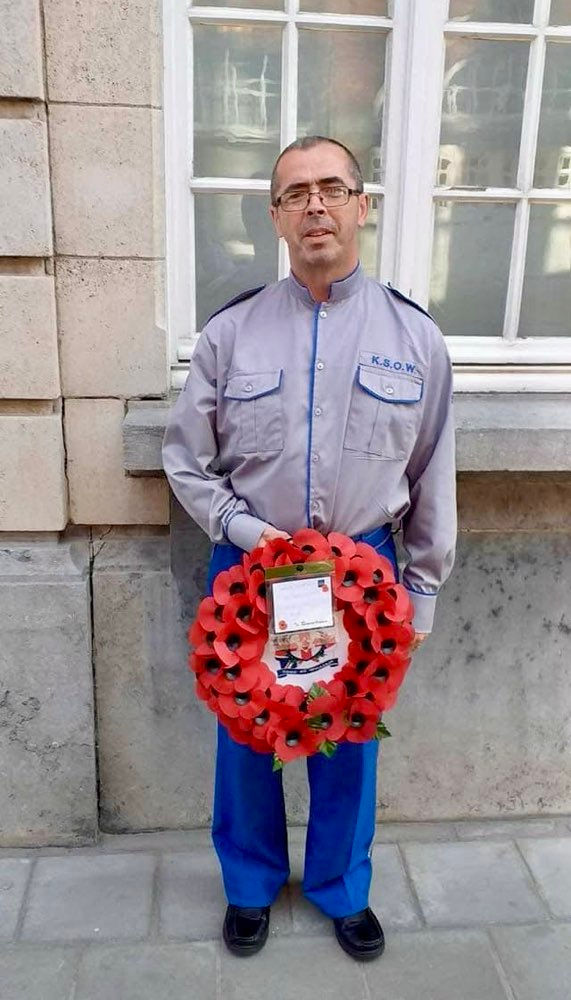 Mr William ‘Booey’ Young with a poppy wreath