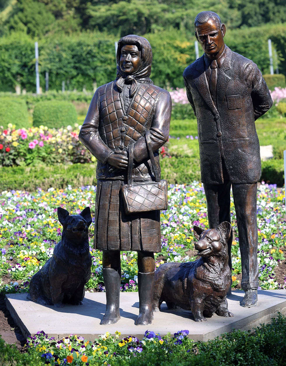The sculpture of Her Late Majesty Queen Elizabeth II fittingly stands adjacent to the statue of her beloved husband, Prince Philip, highlighting their united presence throughout their remarkable lives.