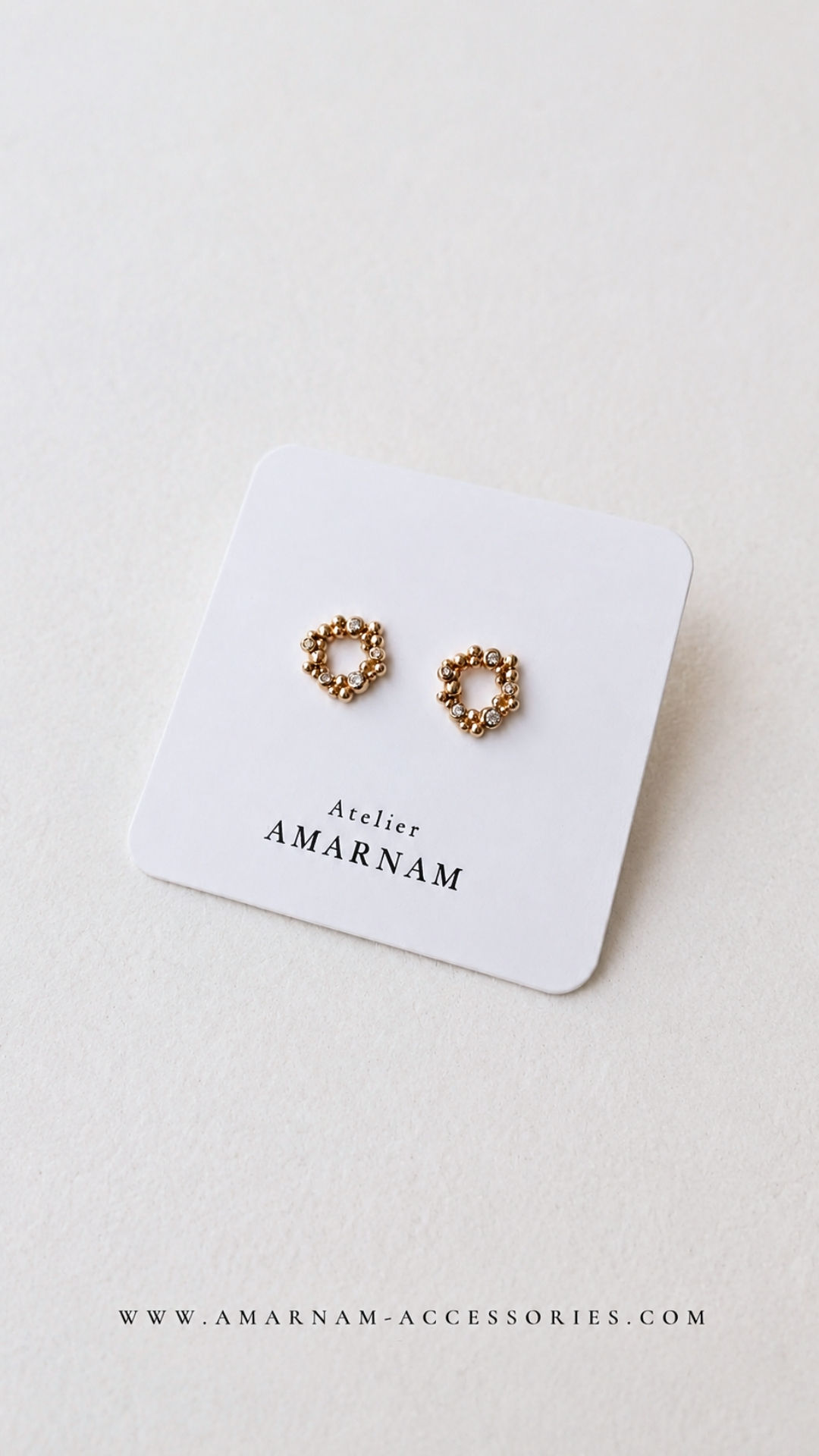 GRAIN CIRCLE STUD EARRINGS