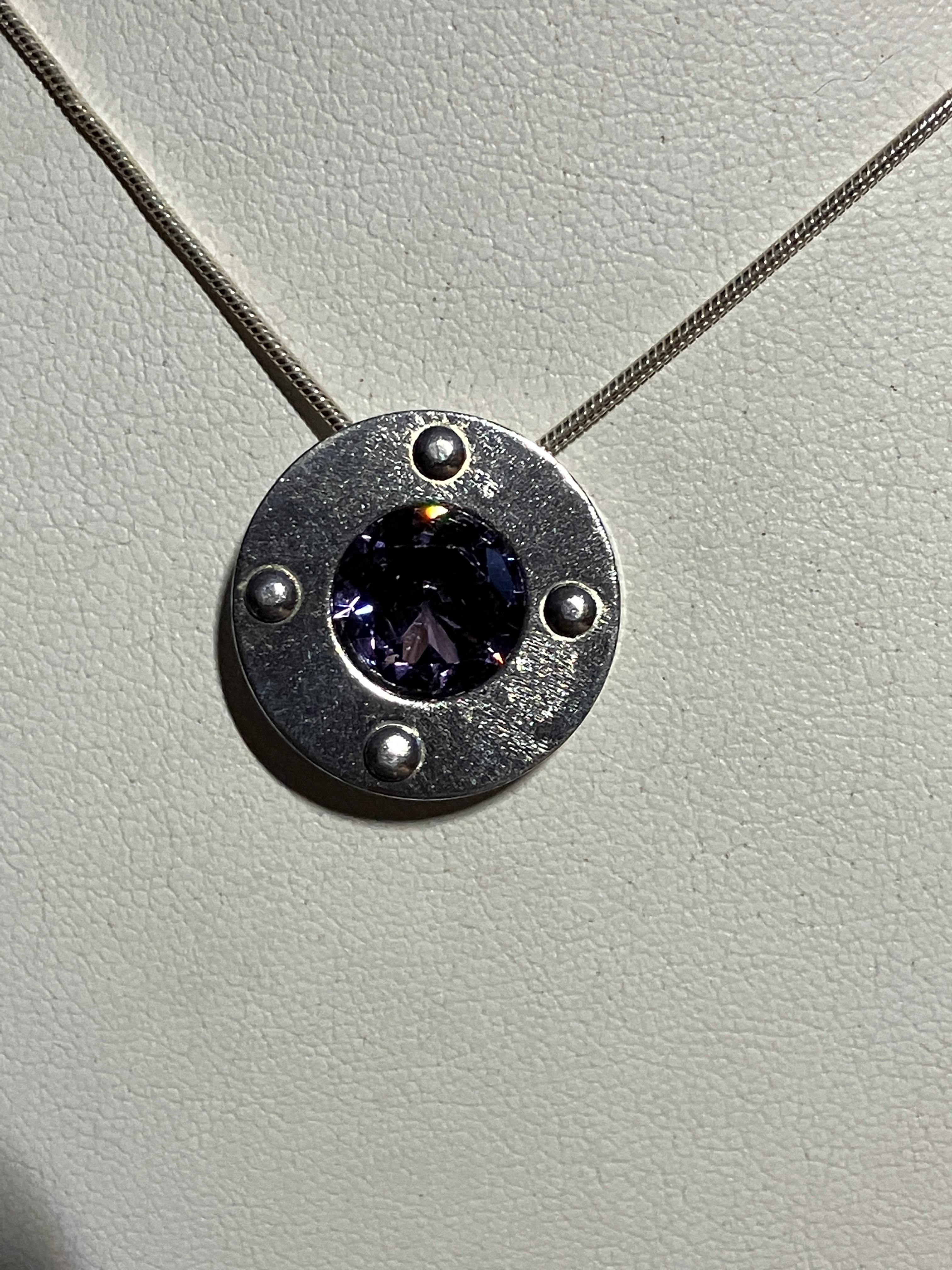 Sterling Silver Riveted Circle w/ Amethyst (lab)