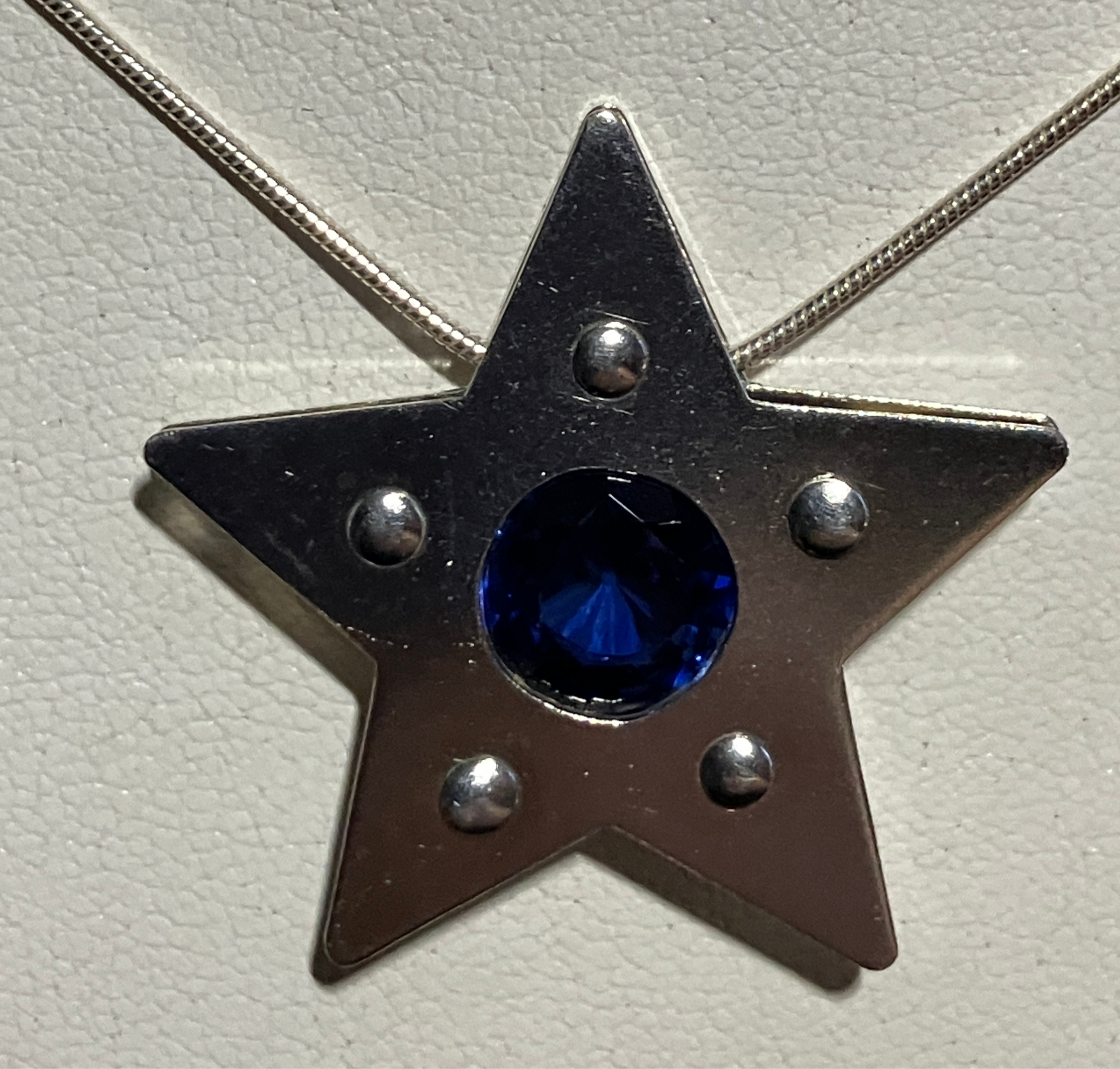 Sterling Silver Riveted Star w/ Sapphire (lab)