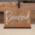 wooden reserved signs