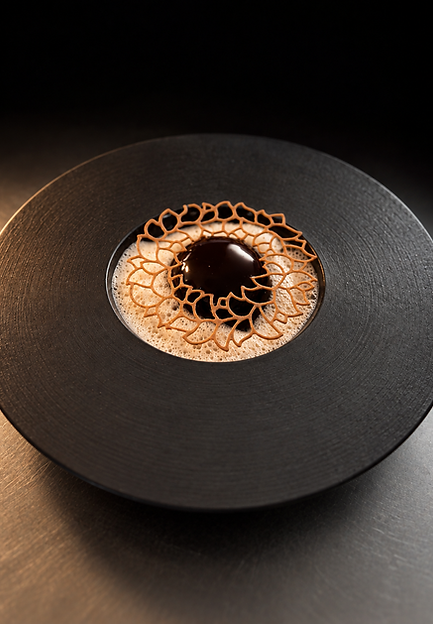 “Le Chocolat”, a dessert with dark chocolate, salted butter caramel, hazelnut praline and almond milk emulsion, at Lounge Roc.