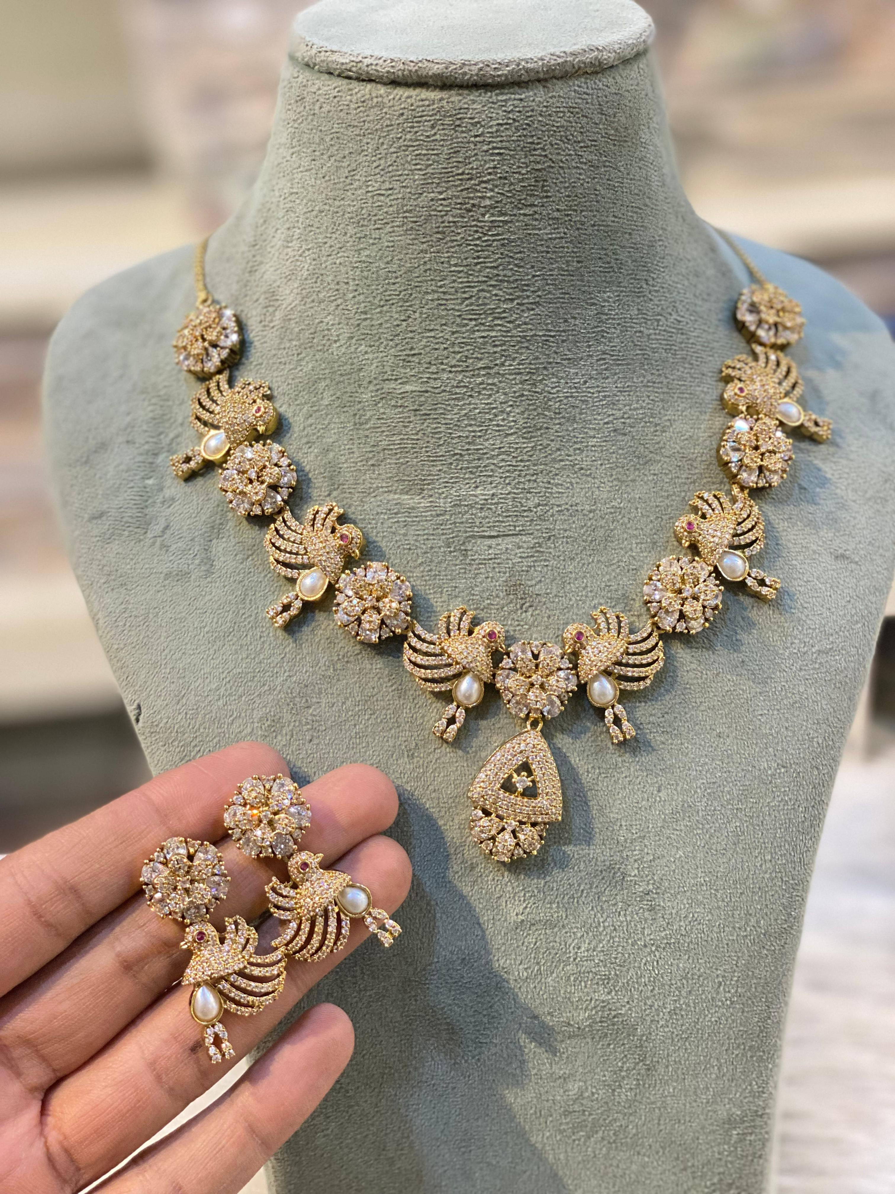 Hira Collections 
Bird Design
American Diamond 
Necklace + Earrings 