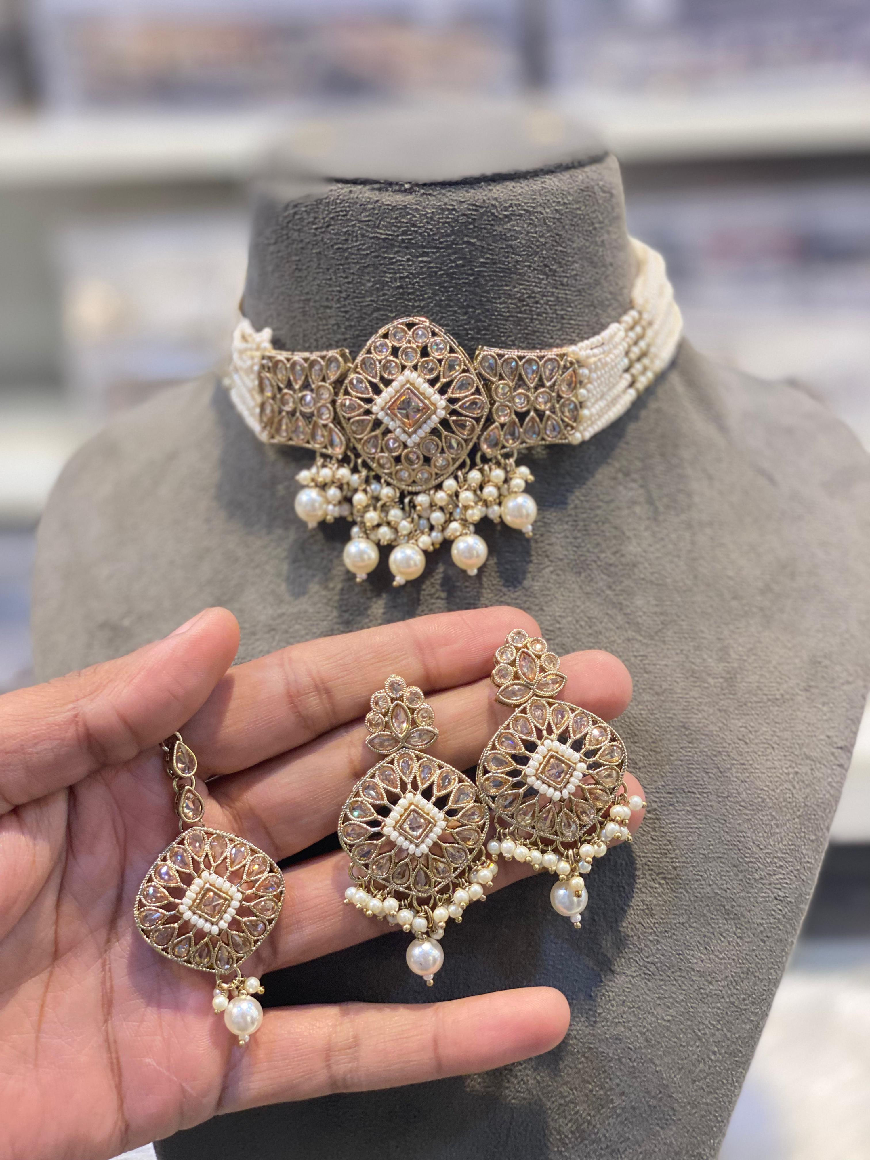 Hira Collections 
Royal Polki
Choker , Earrings, Maangtikka 
Diamond Design 
