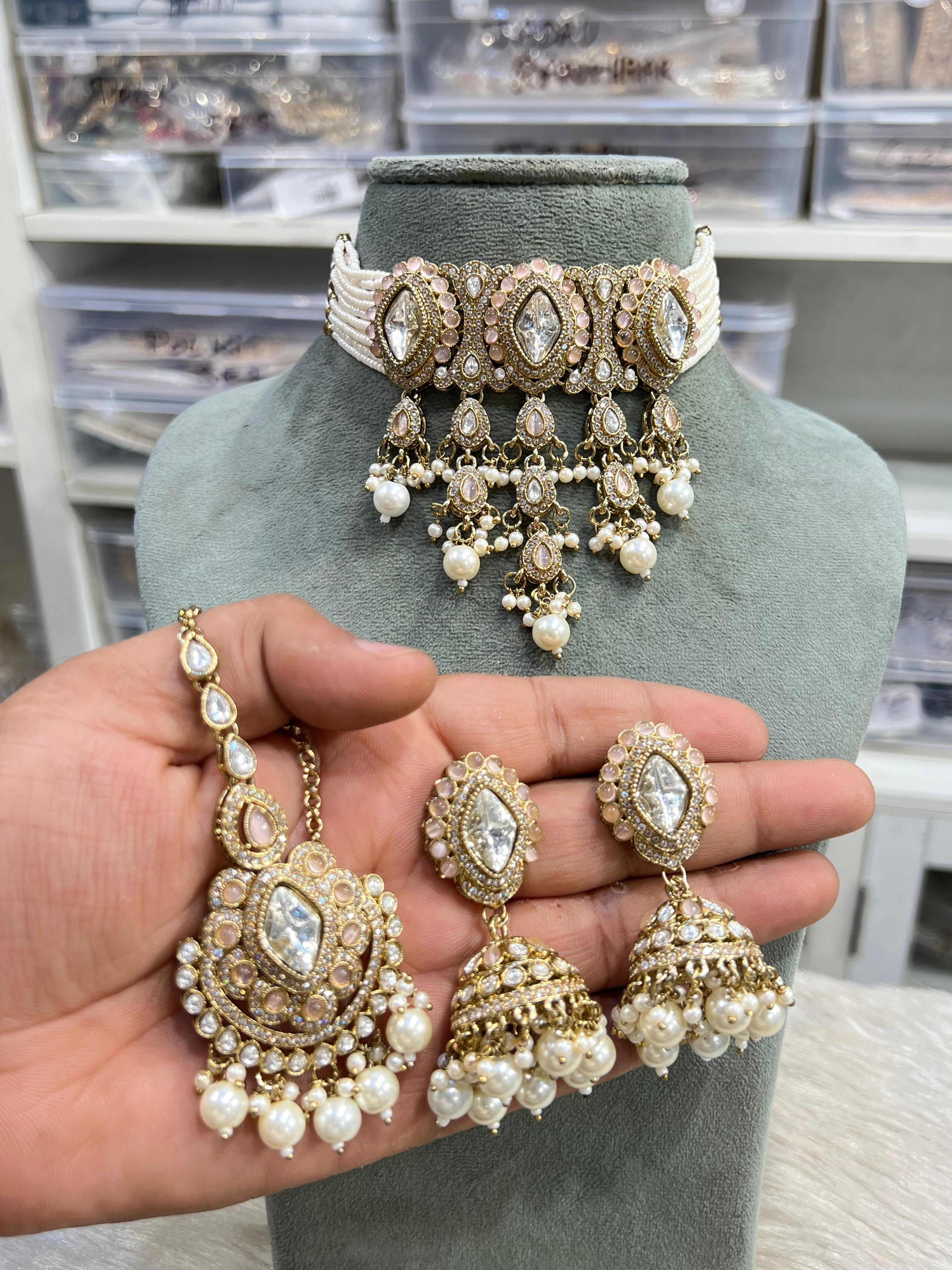 Hira Collections SONIKA 
Polki Choker + Jhumka  Earrings + Tikka 