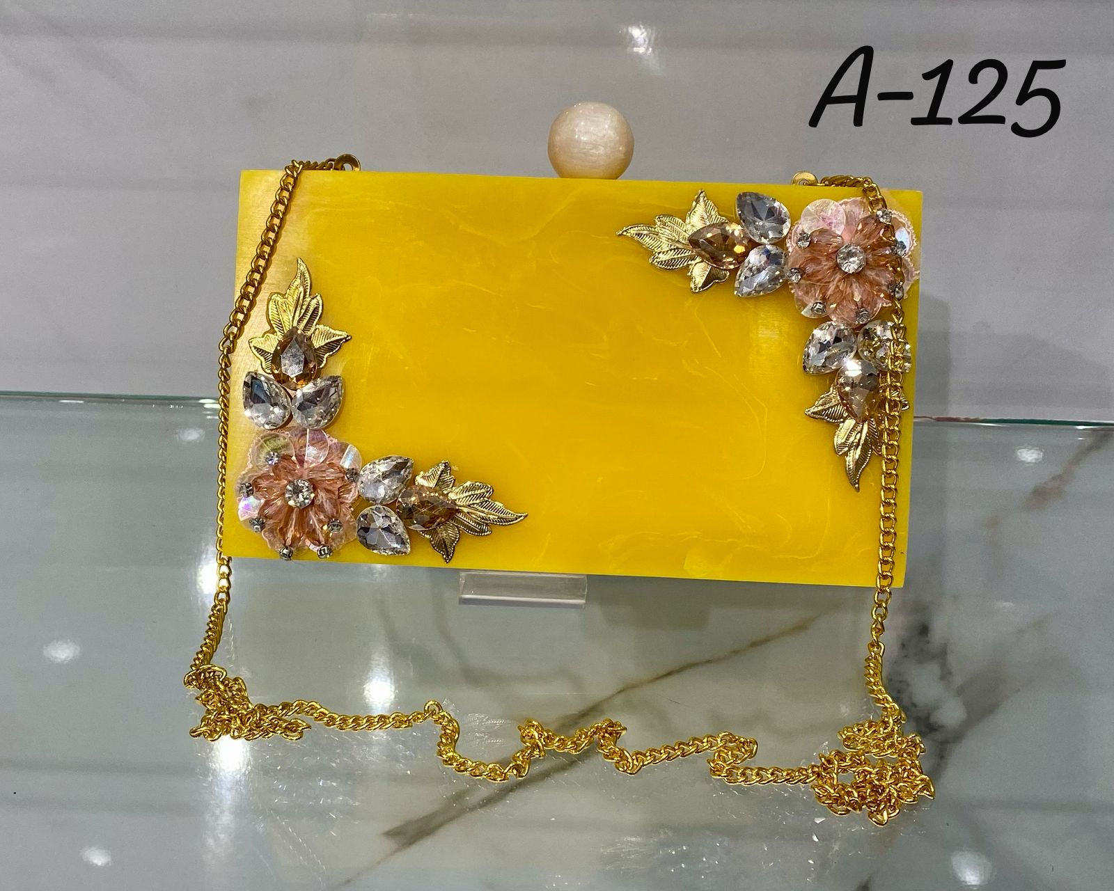 Hira Collections CAT-01
Marble Clutch Purse 
Comes with sling chain