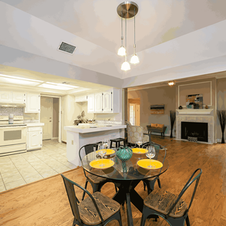 Open-concept kitchen and living room remodeling project with upgraded finishes and layout.
