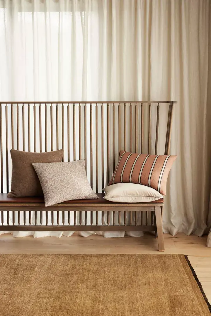 Thumbnail: weave home cushions on a wooden bench