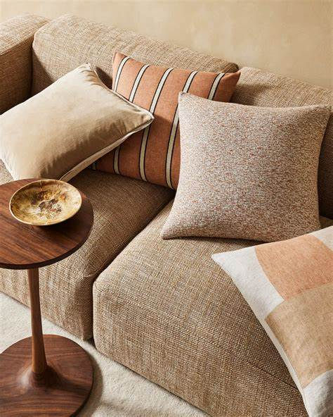 Thumbnail: donnatella earth cushion cover paired with other Weave cushions.