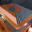 Thumbnail: Pair of Stag Minstrel Leggy Bedside Tables with Hand-Painted Geometric design