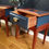 Thumbnail: Pair of Stag Minstrel Leggy Bedside Tables with Hand-Painted Geometric design