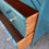 Thumbnail: Retro Mid-Century Chest of Drawers with Gold and Copper Geometric Design