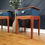 Thumbnail: Pair of Stag Minstrel Leggy Bedside Tables with Hand-Painted Geometric design