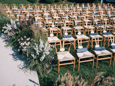 autumn ceremony flowers lining the aisle for a fall wedding