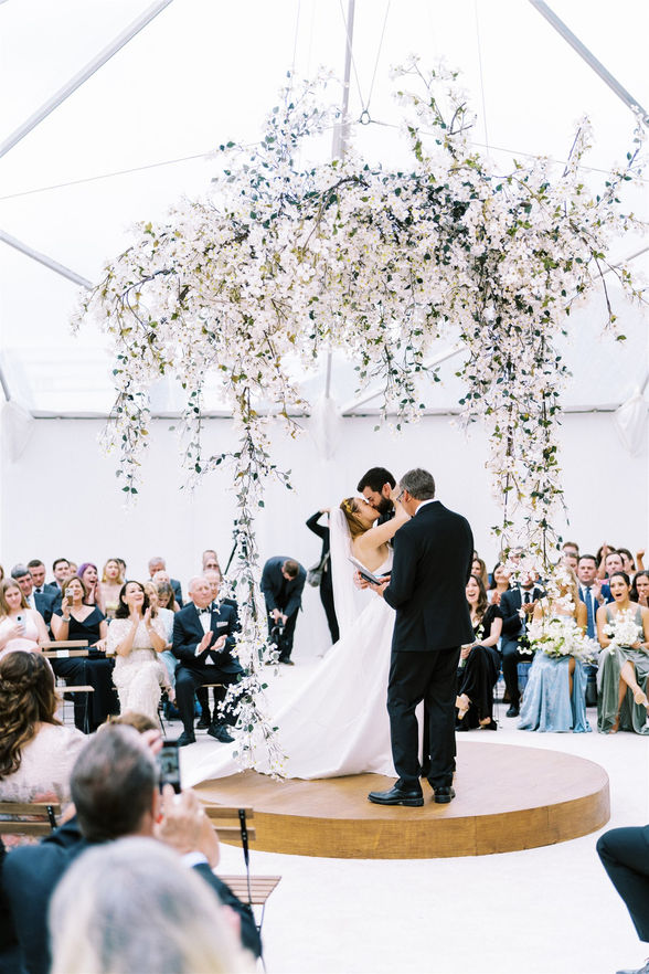 white dogwood wedding ceremony arch