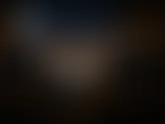 “Families and friends enjoying a magical outdoor movie night under a starry sky, gathered on blankets and lawn chairs around a glowing movie screen, with warm string lights and a full moon creating a cozy, cinematic atmosphere.”