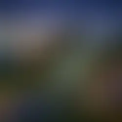 Evening backyard outdoor movie night with a large inflatable screen showing a film. Family and friends sit on blankets and chairs on the grass, enjoying popcorn and drinks. HD projector and speakers set up, soft ambient lights around the garden, and a starry sky overhead creating a cozy and inviting atmosphere