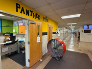 Large fans circulating air throughout Northstar Elementary on a warm day.