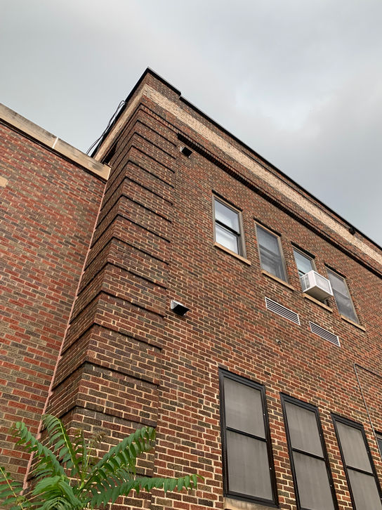 Outdated windows and deteriorating exterior brick at Whitefish Bay Middle School.
