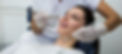 dentist-examining-female-patient-with-tools_edited.jpg