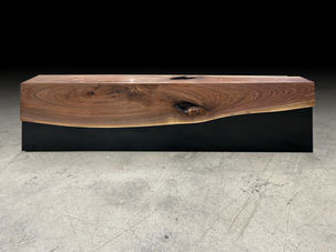 Live edge bench shown with a steel storage base with a live edge walnut slab, natural tree slice.